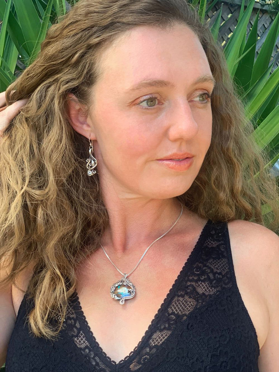 Four Elements Pendant with Koroit Australian Boulder Opal modeled by the artist, Alisha McCormack.