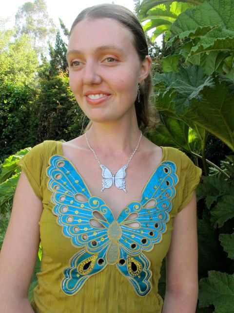 Alisha, modeling the Large Butterfly Pendant with Dragon Fly Earrings