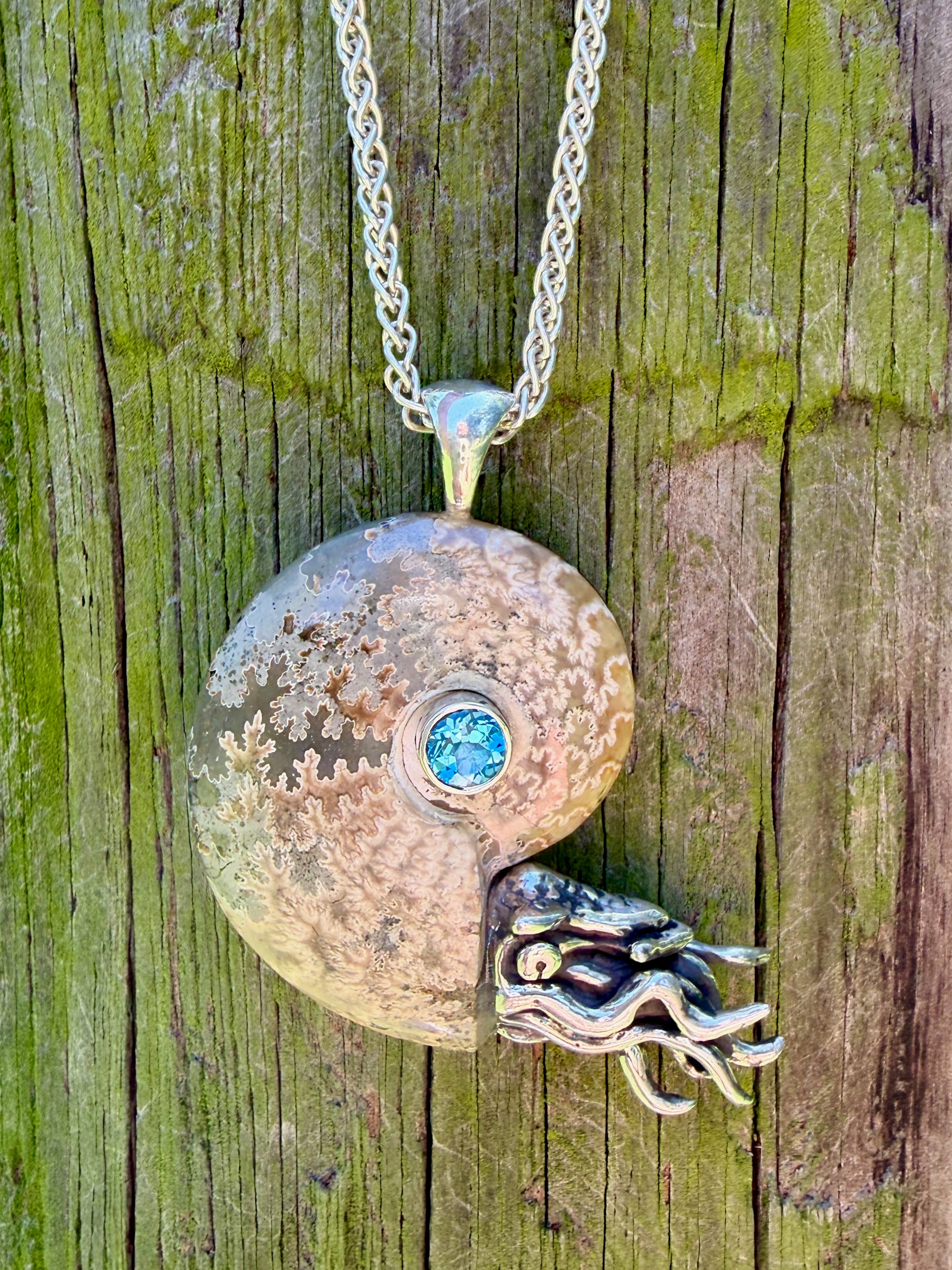 Fossilized Ammonite Nautilus Pendant with Blue Topaz - Sterling Silver