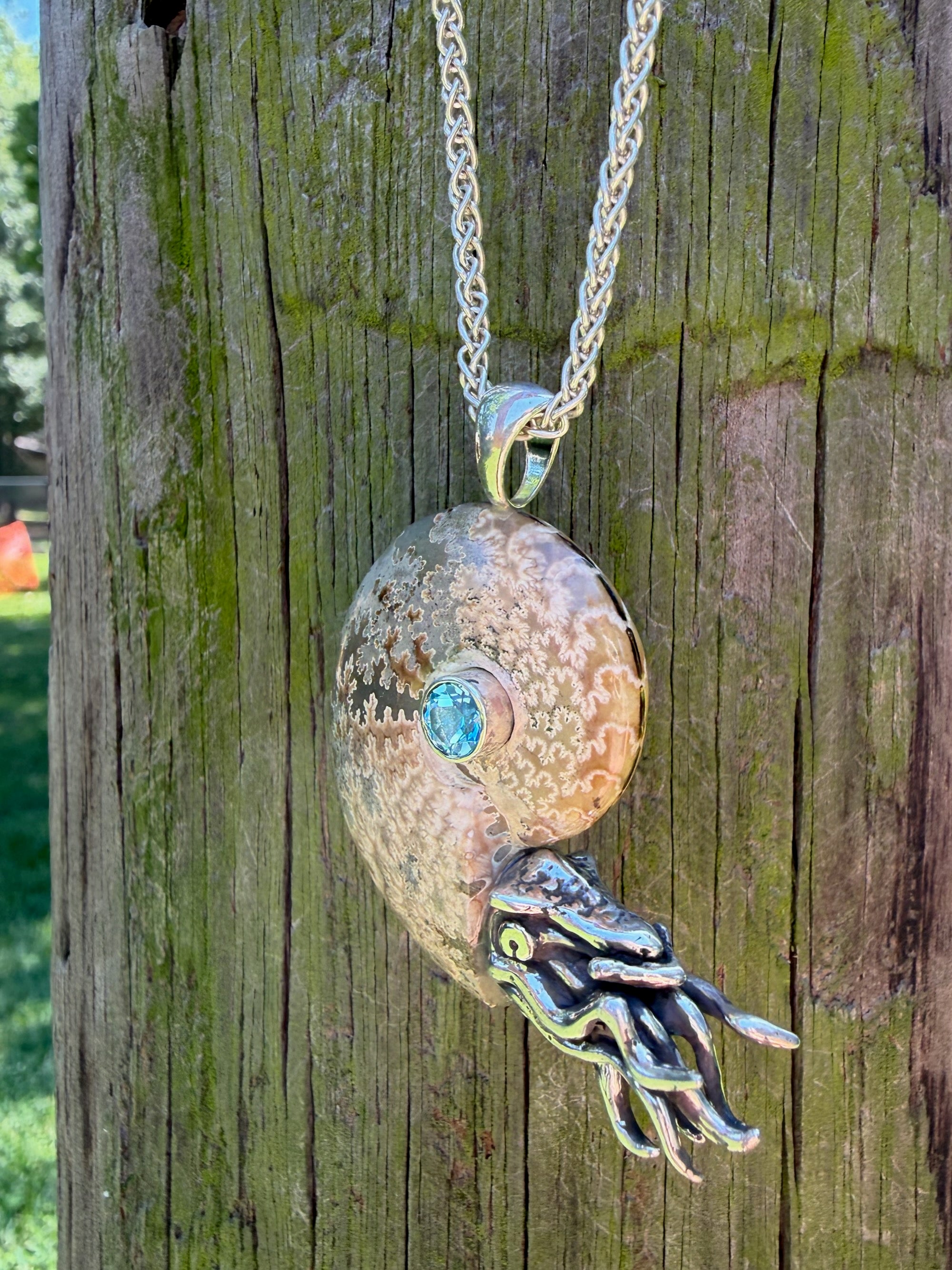 Fossilized Ammonite Nautilus Pendant with Blue Topaz - Sterling Silver