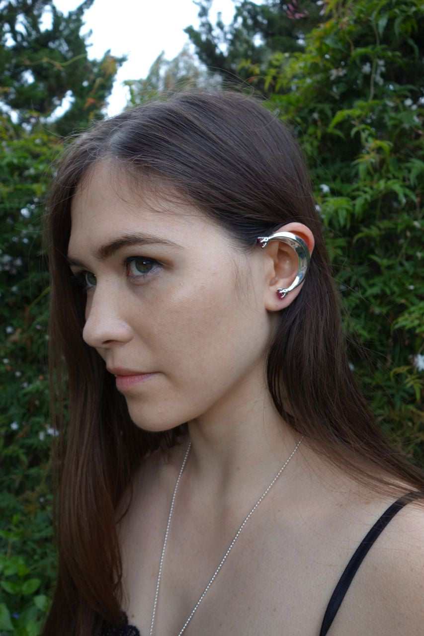 Teresa modeling the Celebrity Style Crescent Ear Wrap with Red CZ's