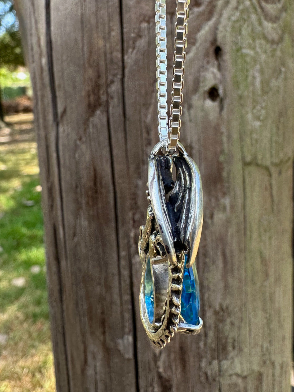Avalon Dragon with 12mm x 17mm Blue topaz Gem - Silver