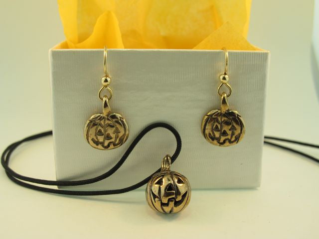 Bronze Jack-O-Lantern Earrings shown above the Bronze Fat Jack-O-Lantern pendant with 24" black cord.