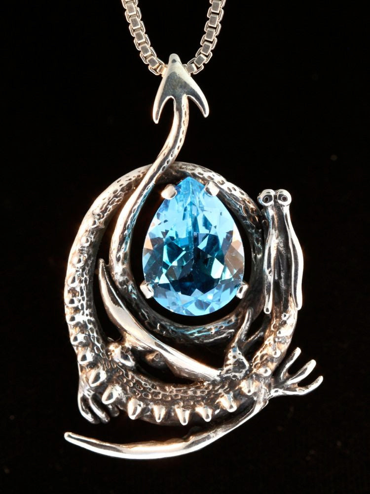 Curled Dragon Pendant with Blue Topaz