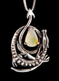 Curled Dragon Pendant with Faceted Ethiopian Fire Opal - Sterling Silver