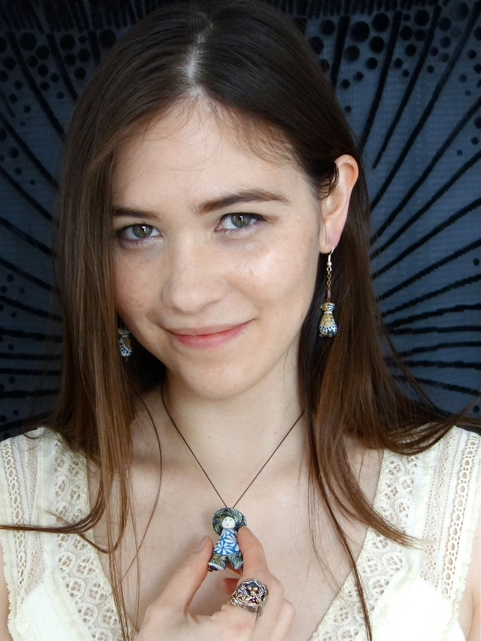 Teresa is pictured wearing the C����_��line��_��_pendant and Christelle earring set