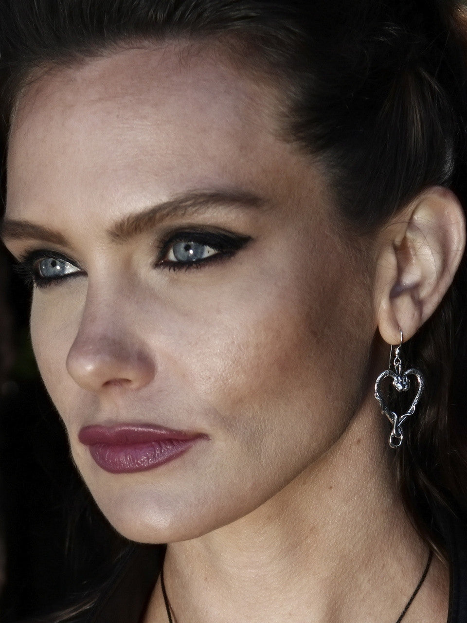 Danielle wearing Viper Valentine Earrings in Sterling Silver