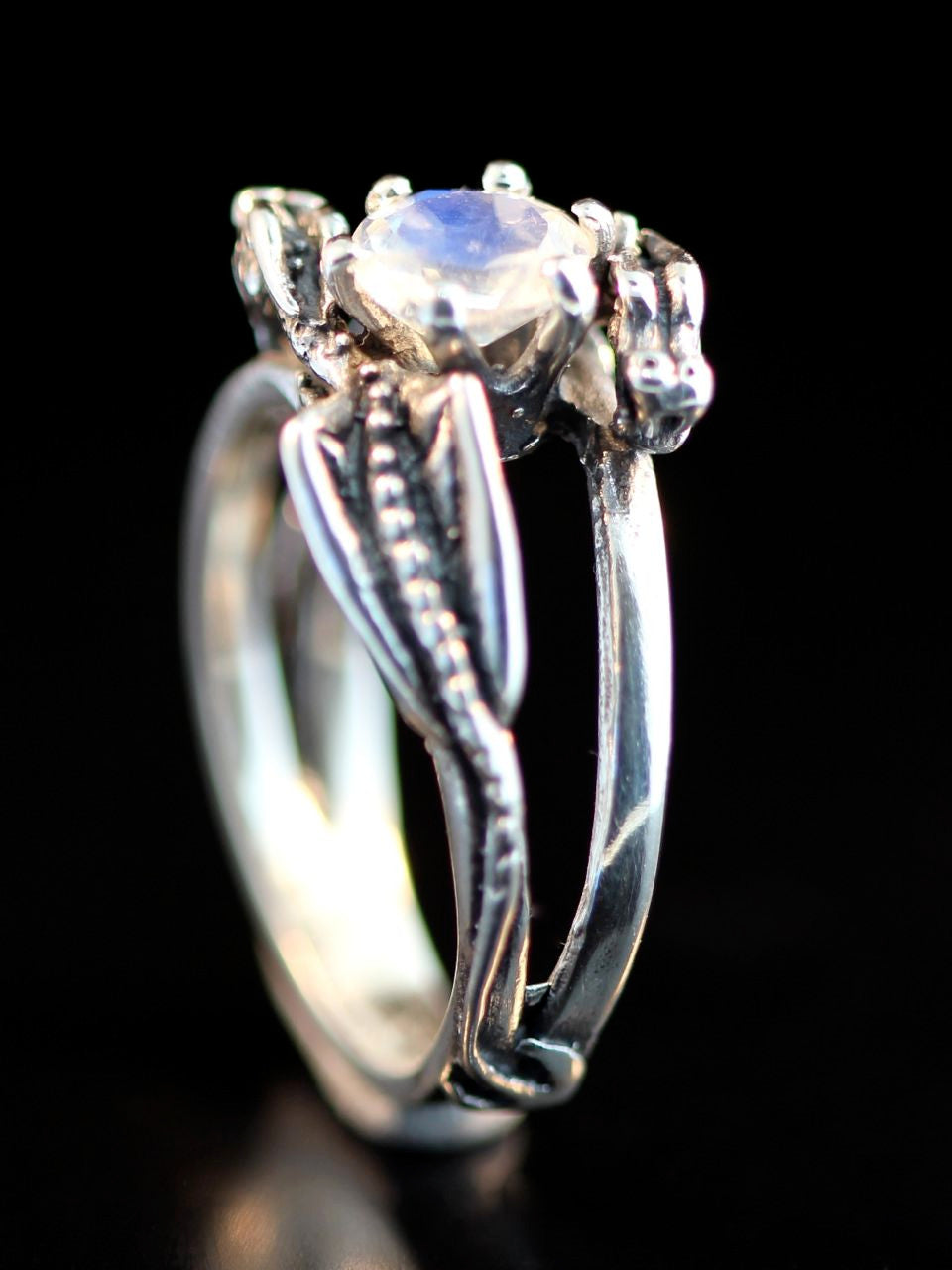 Double Dragon Eternity Wave Ring in Sterling Silver with Blue Topaz