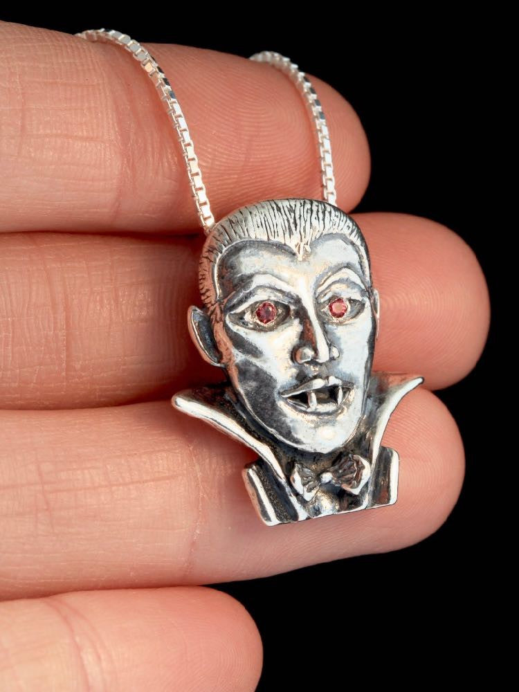 Dracula Vampire Pendant with Ruby Eyes in Silver