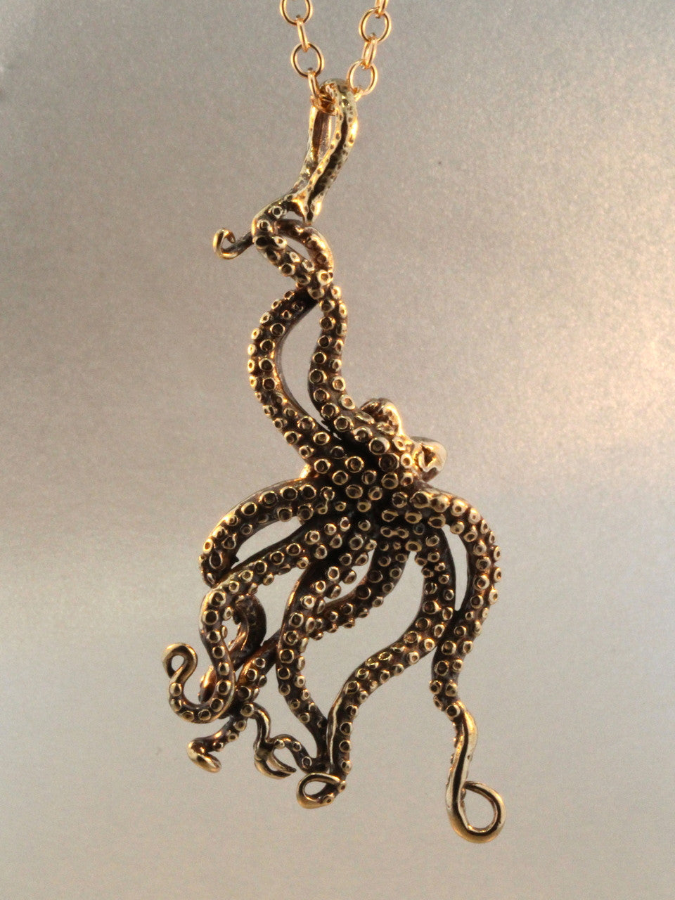 Reverse side of Large Bronze Octopus Pendant - Bronze