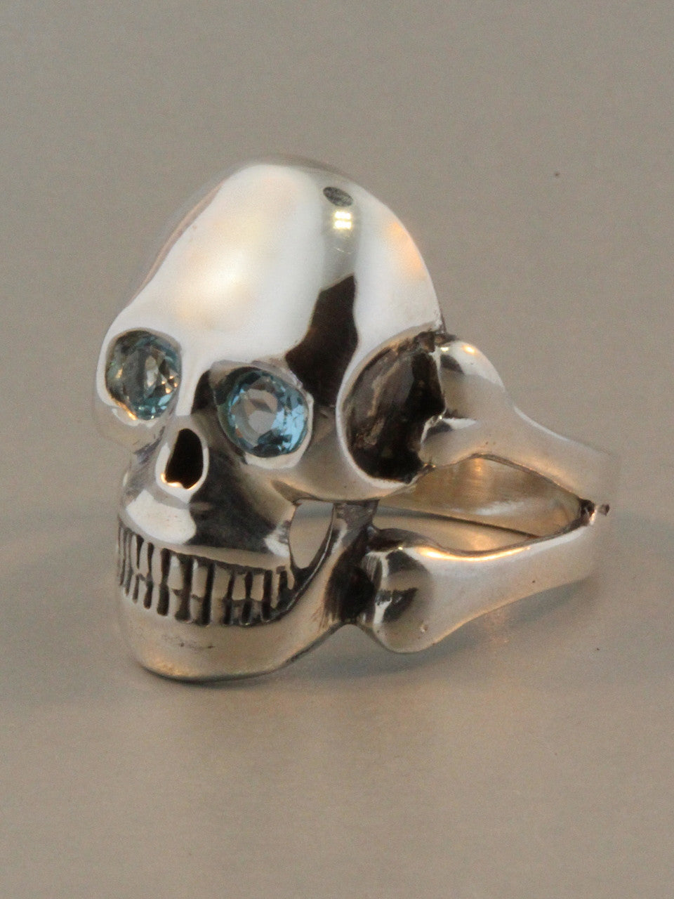 Large Skull and Crossbones Ring with Blue Topaz Eyes - Silver
