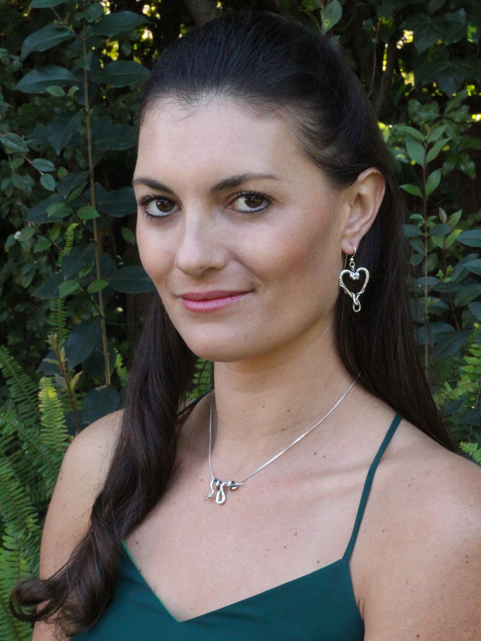 Jessica is wearing the Viper Valentine Earrings and Vine Snake Pendant in Sterling Silver