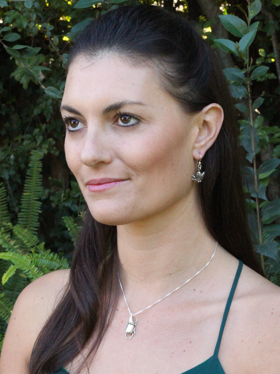 Jessica is wearing Fly and Venus Fly Trap Earrings & Rhinoceros Beetle Charm