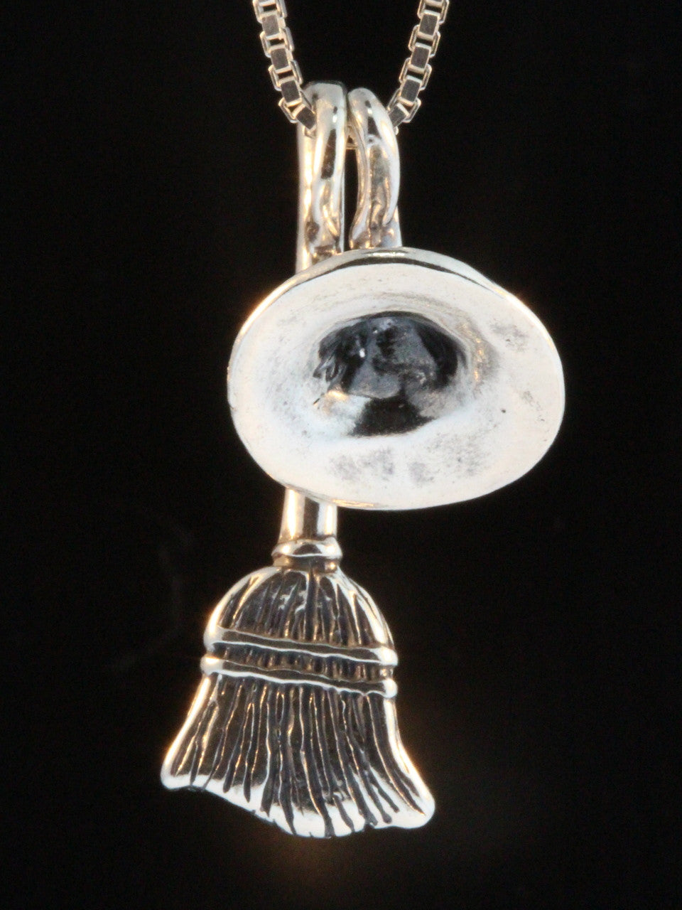 Stir up some magic when you wear the Witch's Hat and Witch's Broom Charm necklace