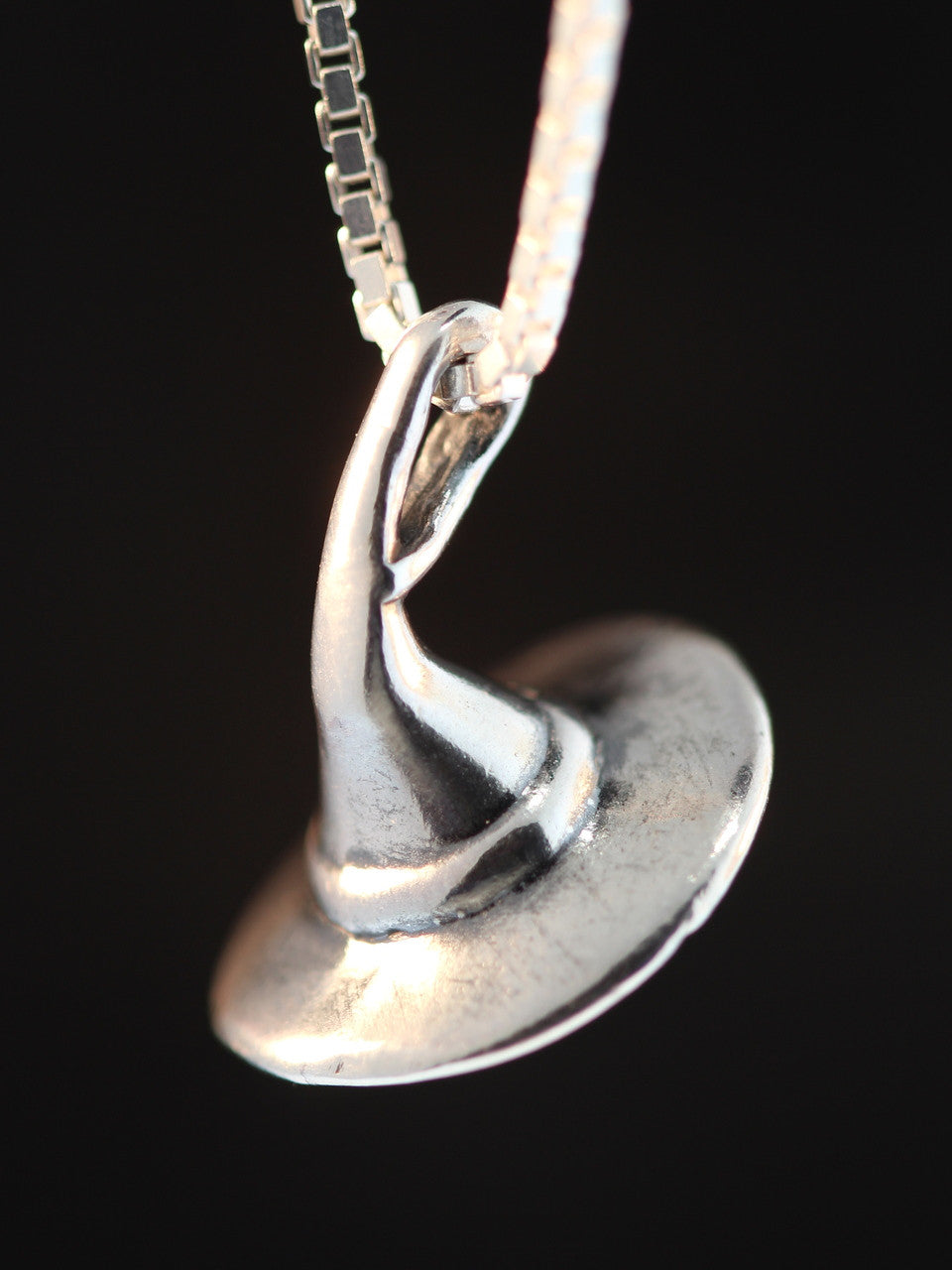 Stir up some "Magic" wearing this whimsical Witch's Hat Charm!