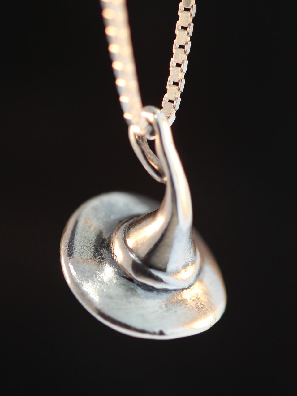 Stir up some "Magic" wearing this whimsical Witch's Hat Charm!