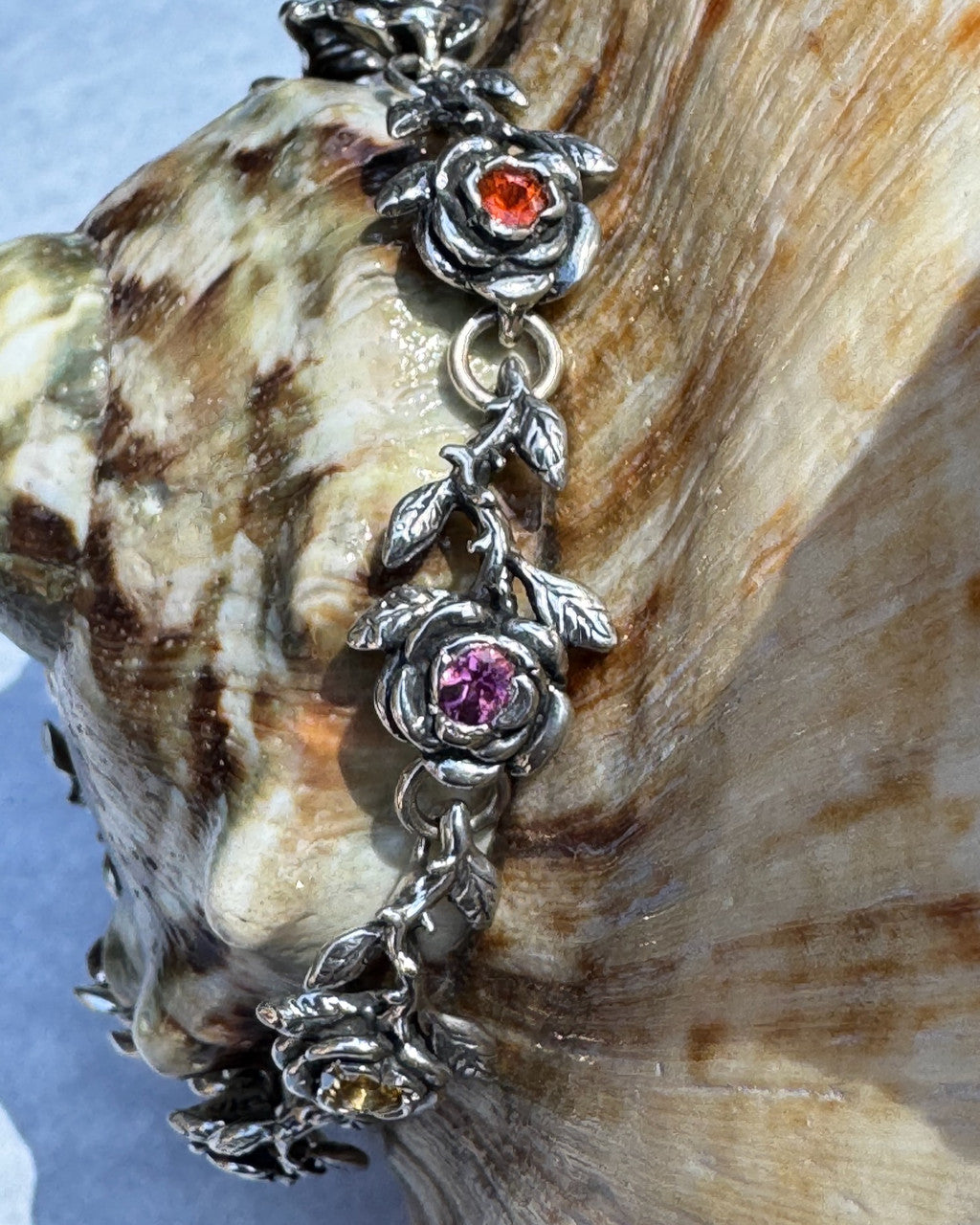 Rose Bracelet with Gemstones - 2 x Citrine, 1 x
Pink Tourmaline, 1 x Rhodolite Garnet, 2 x Mexican Opal, 2 x Amethyst -Silver