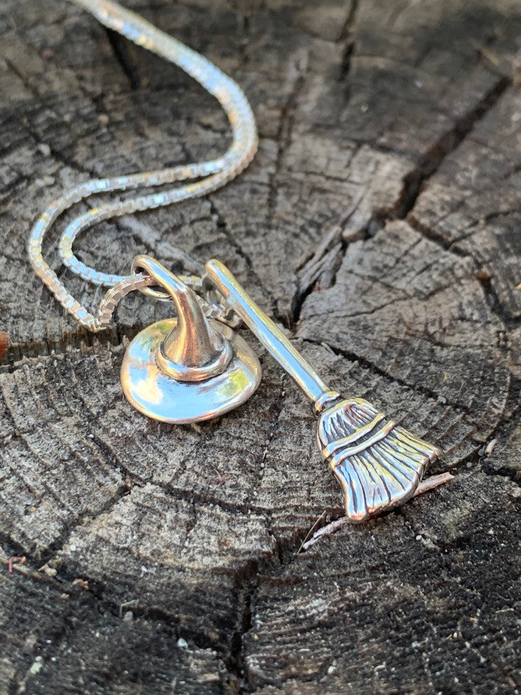 Stir up some magic when you wear the Witch's Hat and Witch's Broom Charm necklace
