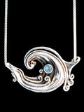 Rip Curl Pendant with 4mm Blue Topaz - Sterling Silver