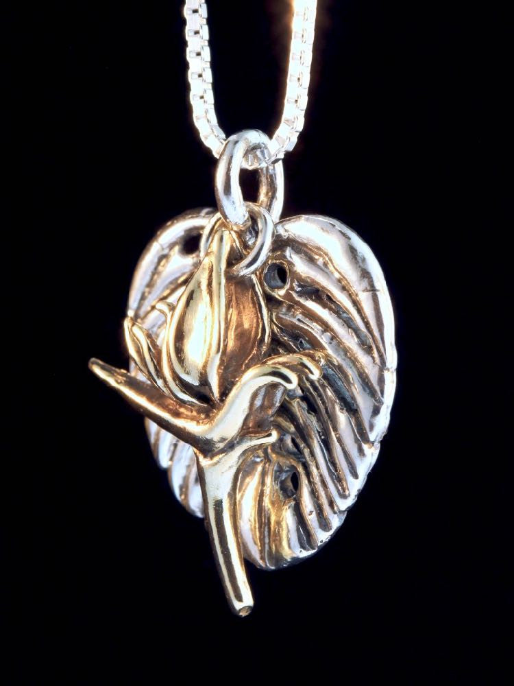 Silver Monstera Leaf with 14K gold Jungle Jewel Bird of Paradise.