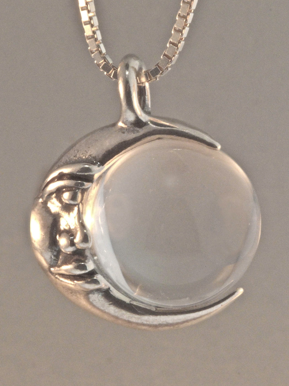 Moon Orb Pendant with Quartz Crystal