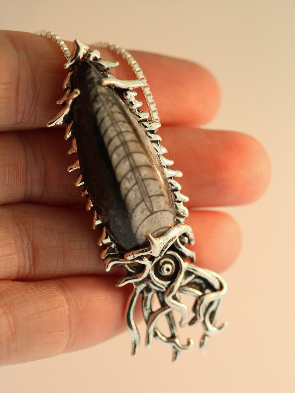 Fossilized Orthoceras Creature Pendant