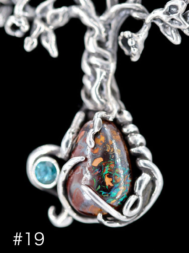 #19 Australian Koroit  Boulder Opal w/ 4mm Blue Topaz
