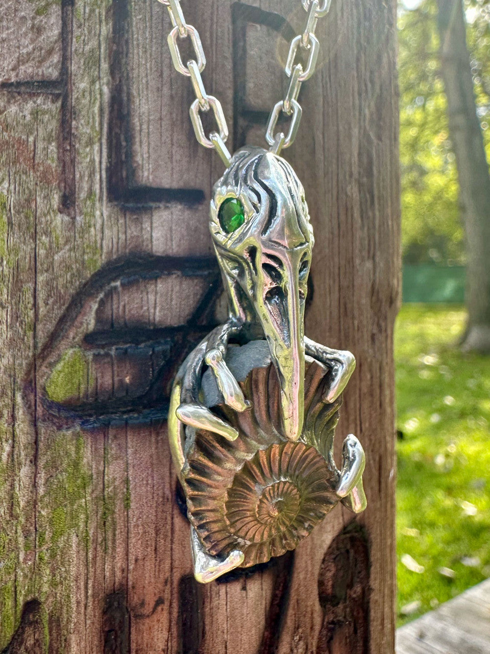 Raven Skull with Ammonite Negative and Tsavorite Eyes - Silver