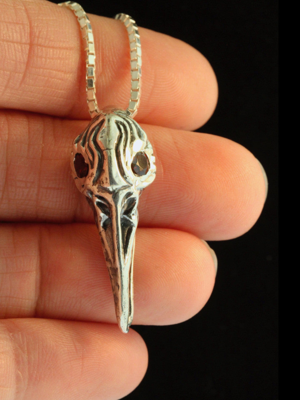 Raven Skull Pendant with Garnet Eyes - Silver