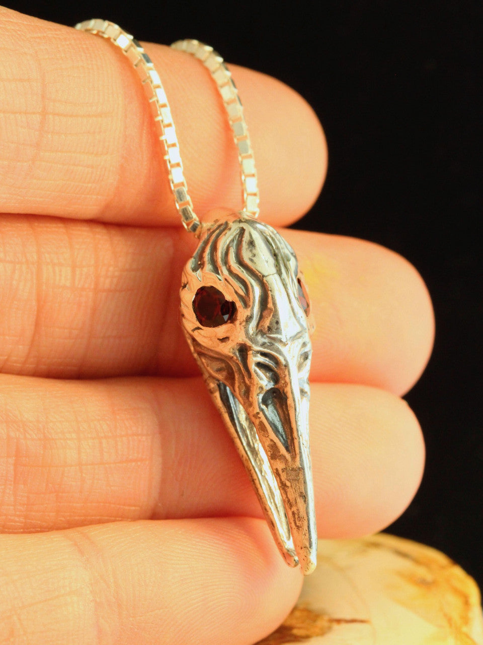 Raven Skull Pendant with Garnet Eyes - Silver
