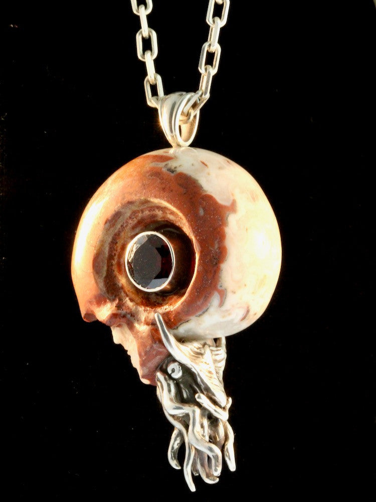 Colossal Carved Skull Ammonite Nautilus Pendant with 10mm Garnet