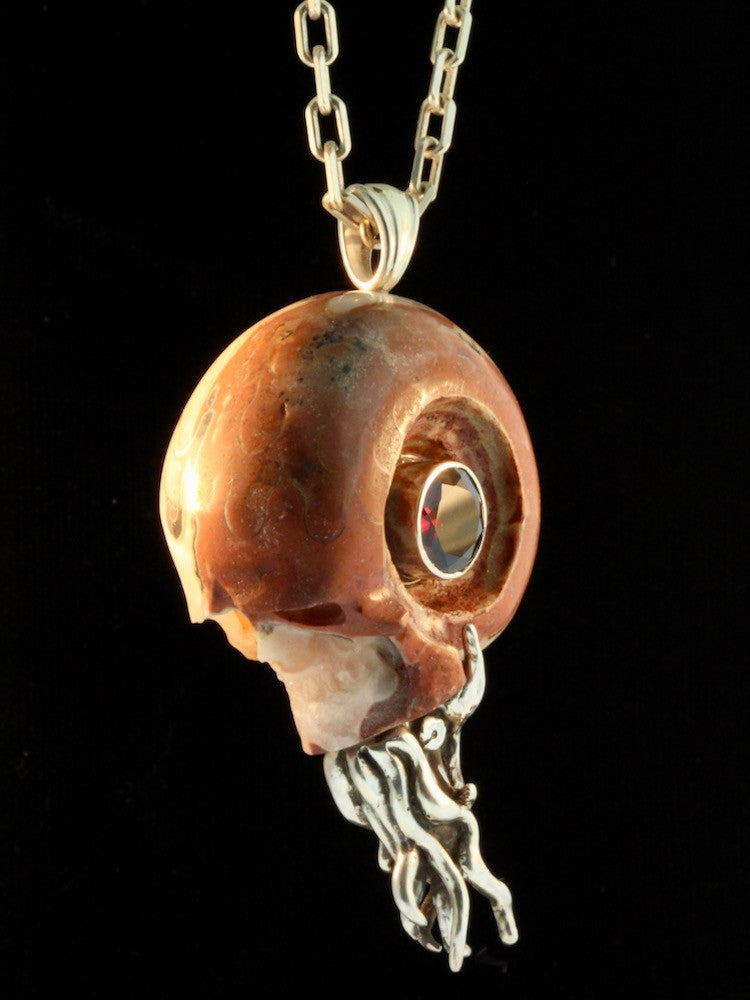 Colossal Carved Skull Ammonite Nautilus Pendant with 10mm Garnet