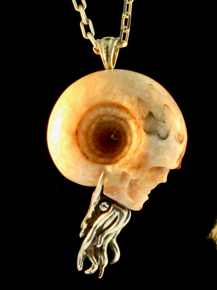 Colossal Carved Skull Ammonite Nautilus Pendant with 10mm Garnet