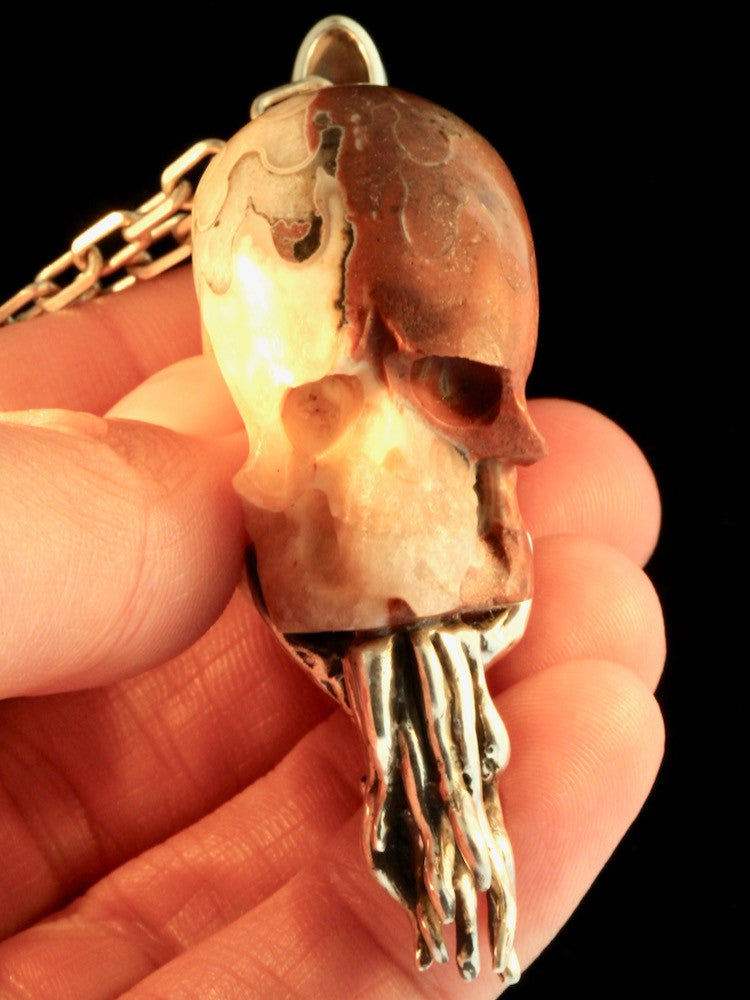 Colossal Carved Skull Ammonite Nautilus Pendant with 10mm Garnet