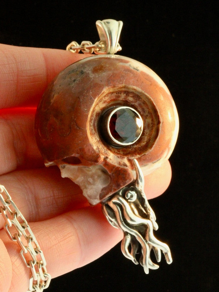 Colossal Carved Skull Ammonite Nautilus Pendant with 10mm Garnet