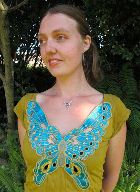 My lovely daughter, Alisha is modeling this graceful Fairy pendant.